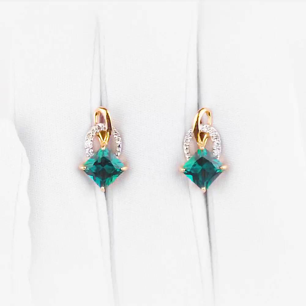 Серьги с изумрудом синтетическим и бриллиантами из красного золота 585 пробы 1
