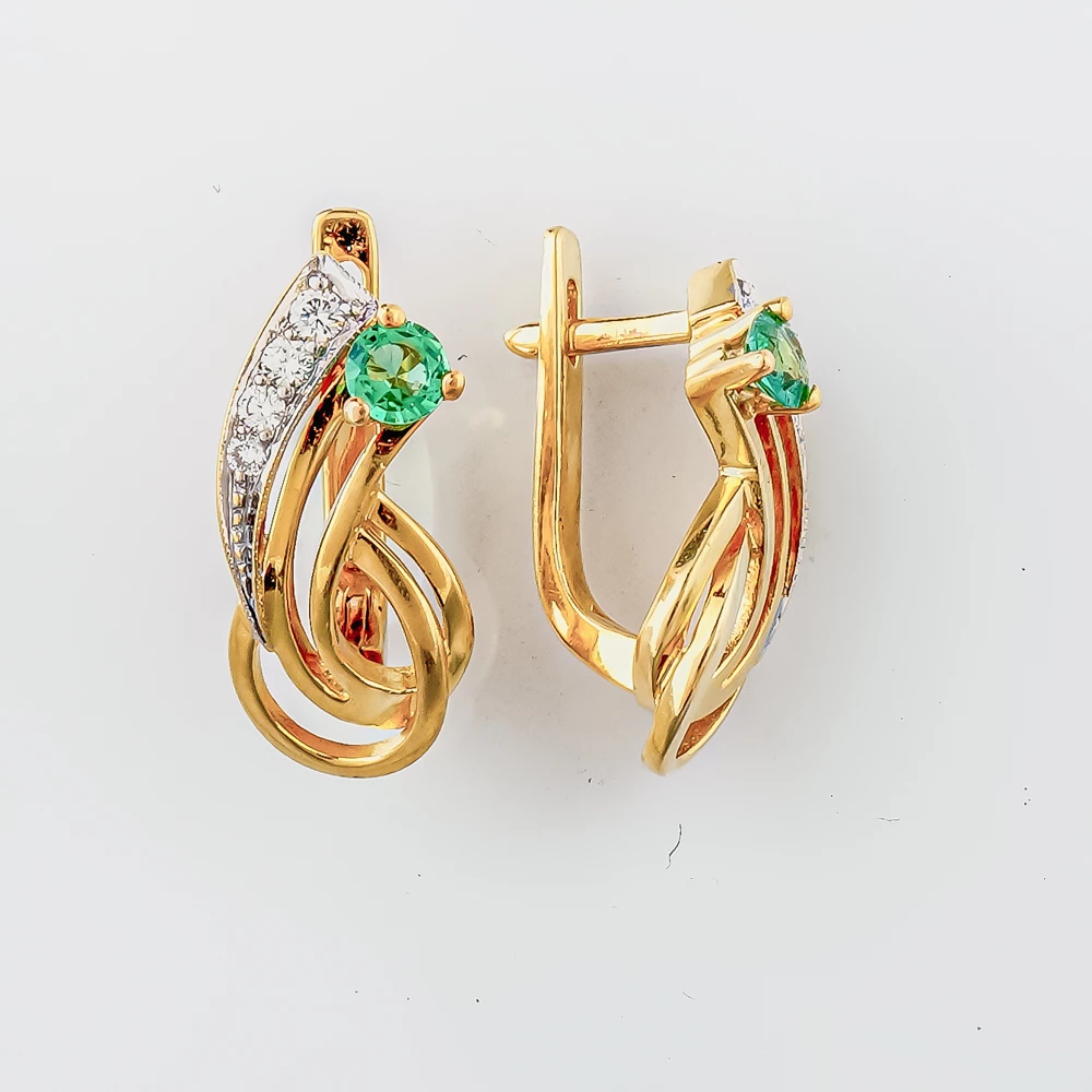 Серьги с изумрудом из желтого золота 750 пробы 1