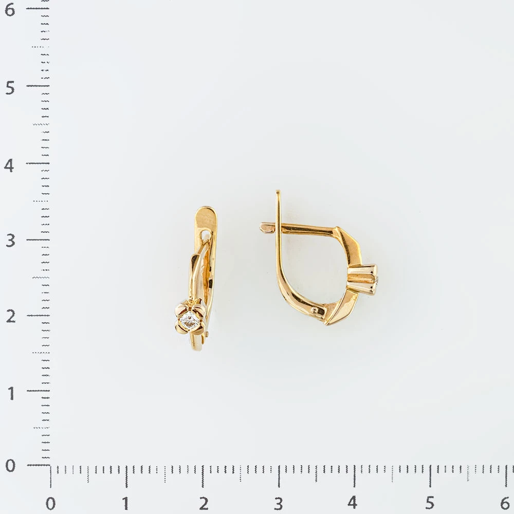 Серьги с бриллиантом из желтого золота 750 пробы 2