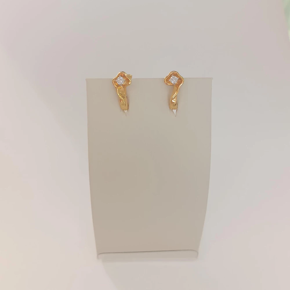 Серьги с бриллиантом из желтого золота 750 пробы 1