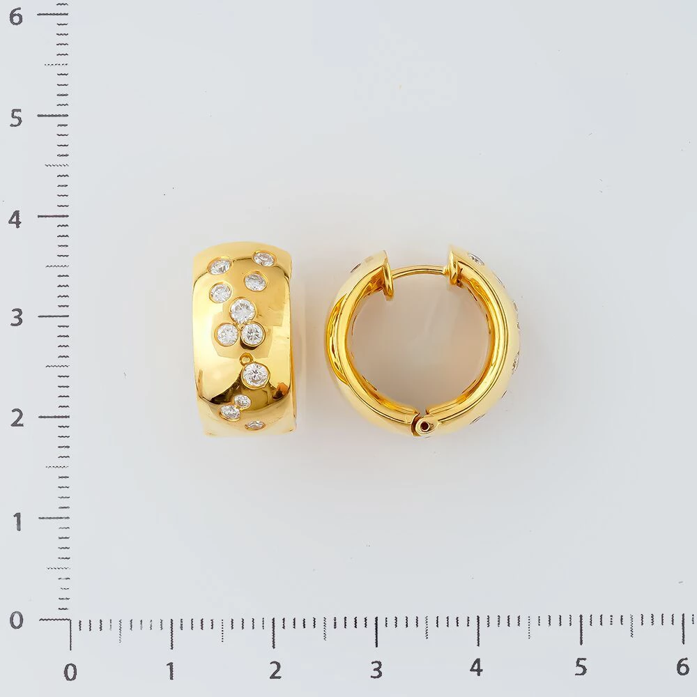 Серьги конго с бриллиантом из желтого золота 750 пробы