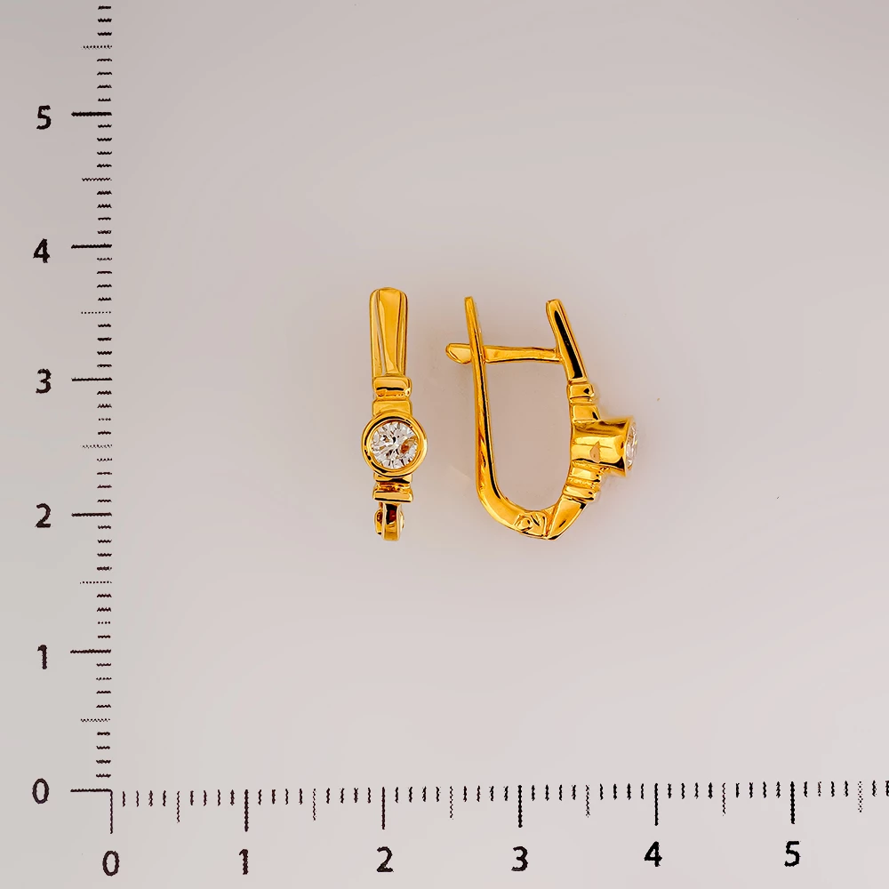 Серьги с бриллиантом из желтого золота 750 пробы