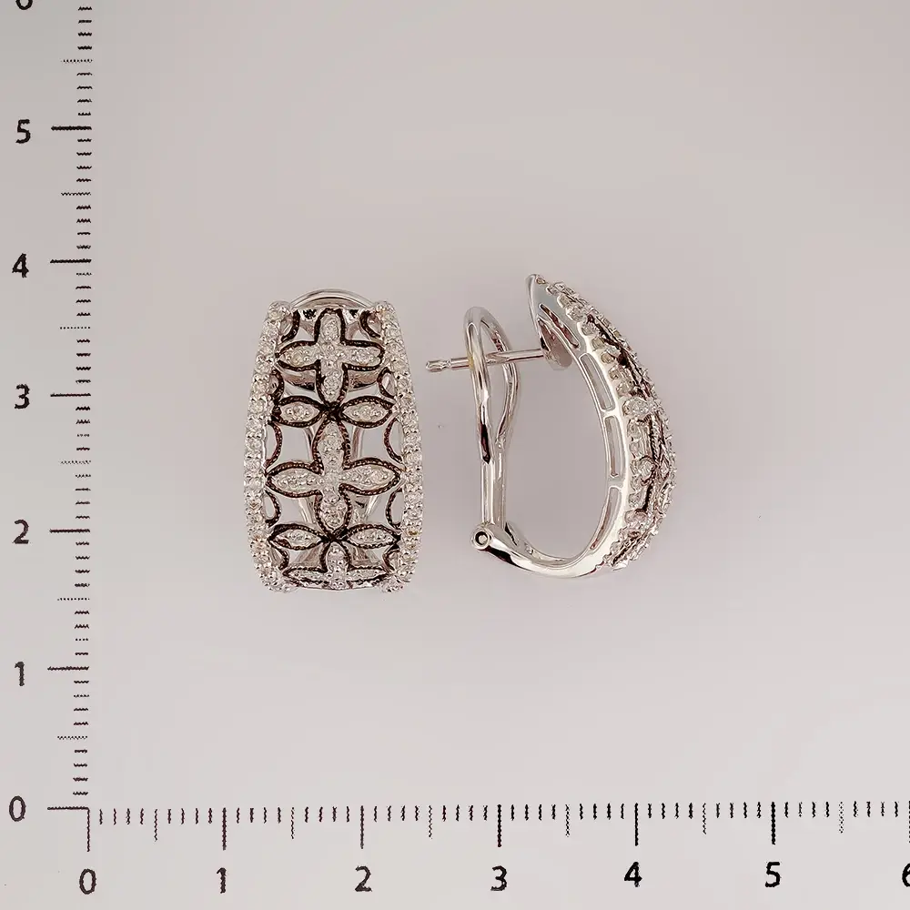 Серьги с бриллиантом из белого золота 750 пробы