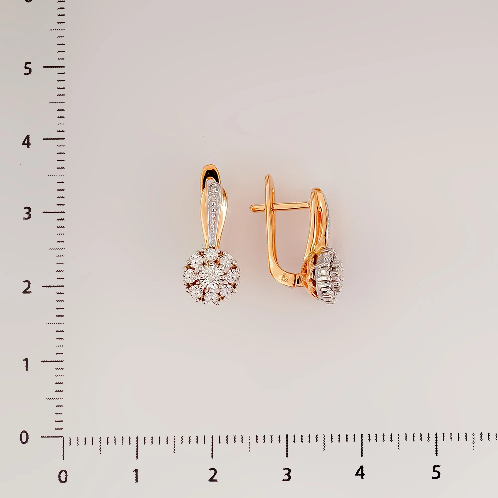 Серьги с бриллиантом из красного золота 585 пробы