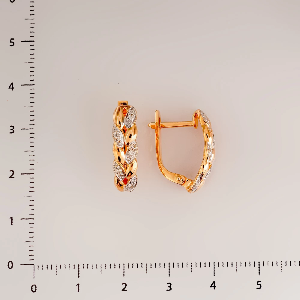 Серьги с бриллиантом из красного золота 585 пробы