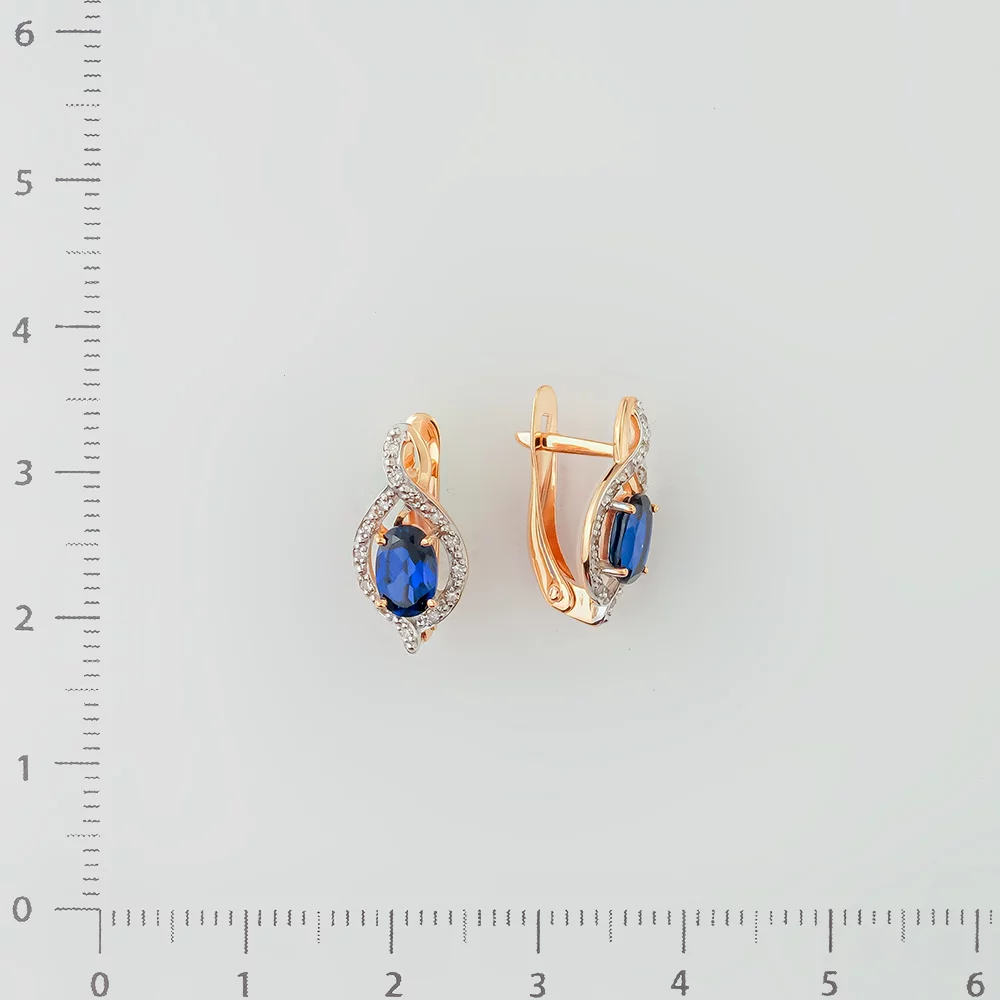 Серьги с бриллиантом из красного золота 585 пробы